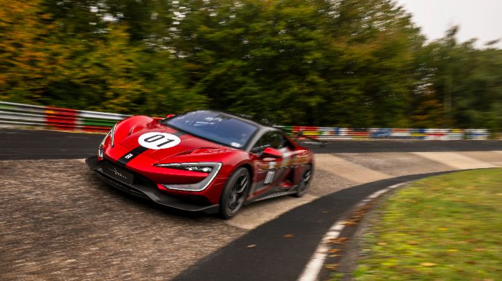 The red Yangwang U9 Xtreme takes a corner at high speed on the Nürburgring Nordschleife