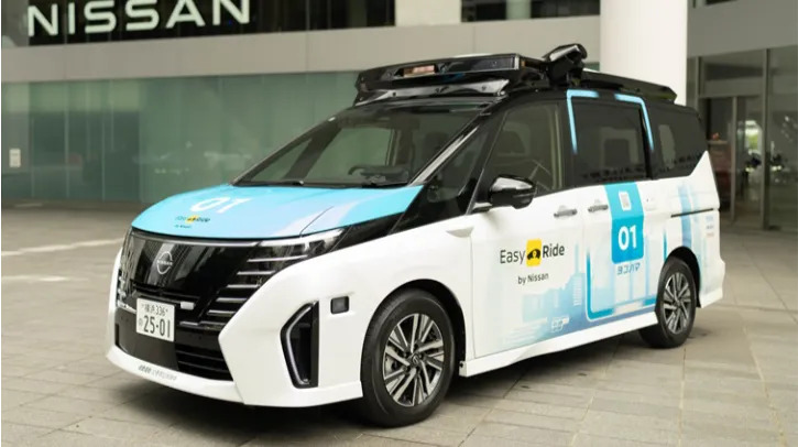 An autonomous Nissan Serena parked in an underground parking garage