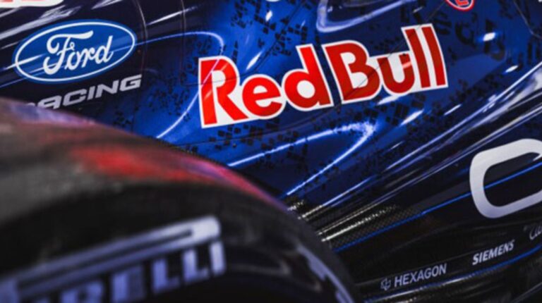 Red Bull Ford Powertrains reveals how metrology partner Hexagon helped shape its first F1 powertrain Close-up of the Red Bull and Ford Racing branding on an F1 car.